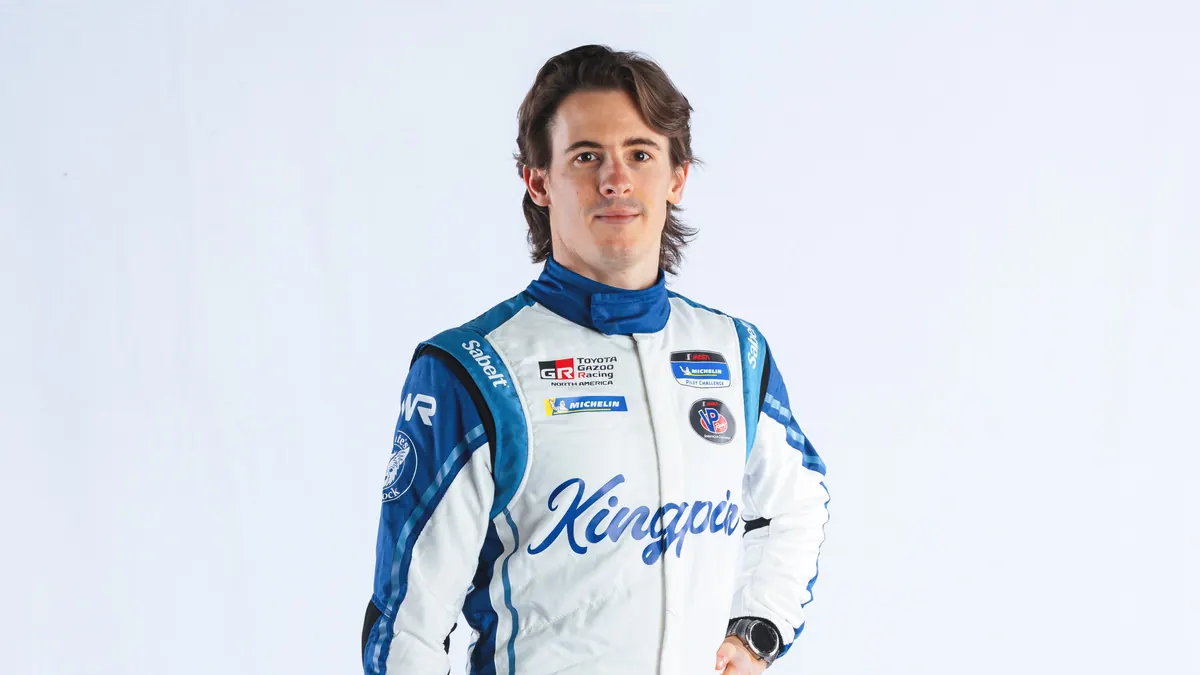 David Hodge Jr beside a race car at Daytona