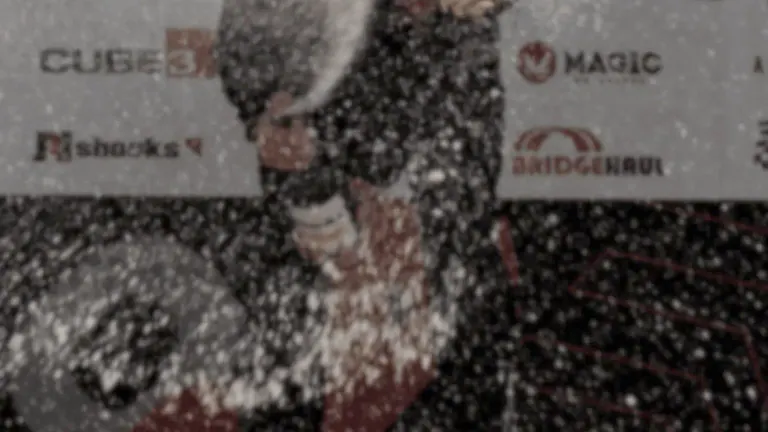 David Hodge Jr standing with a race trophy at Daytona