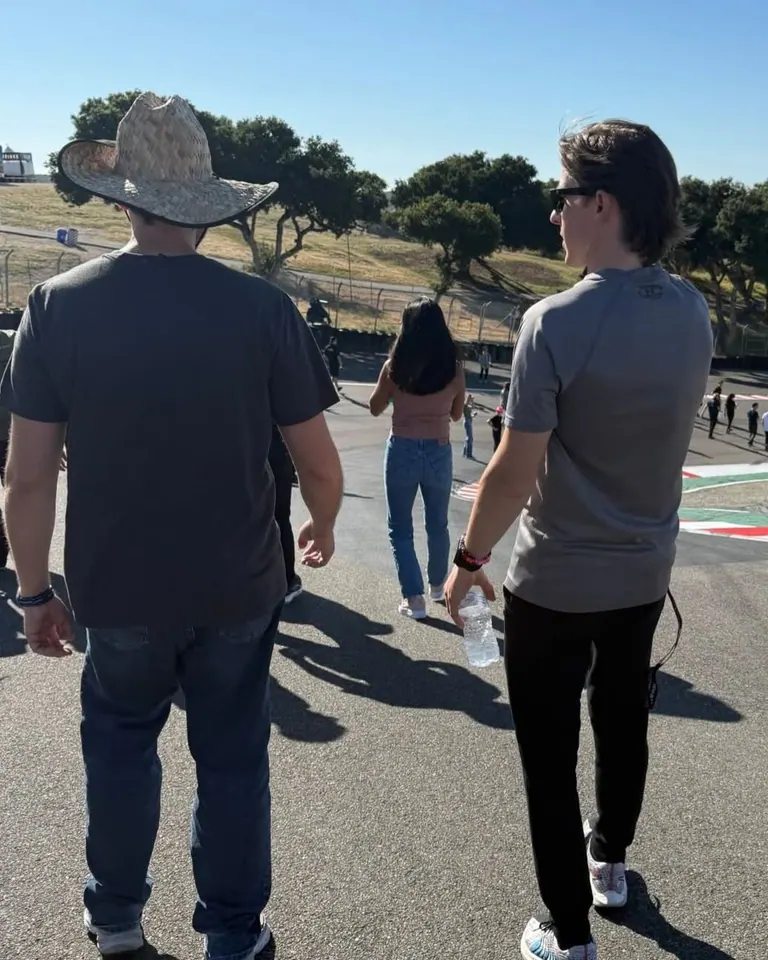 David Hodge Jr walking the Corkscrew at Laguna Seca with a driver